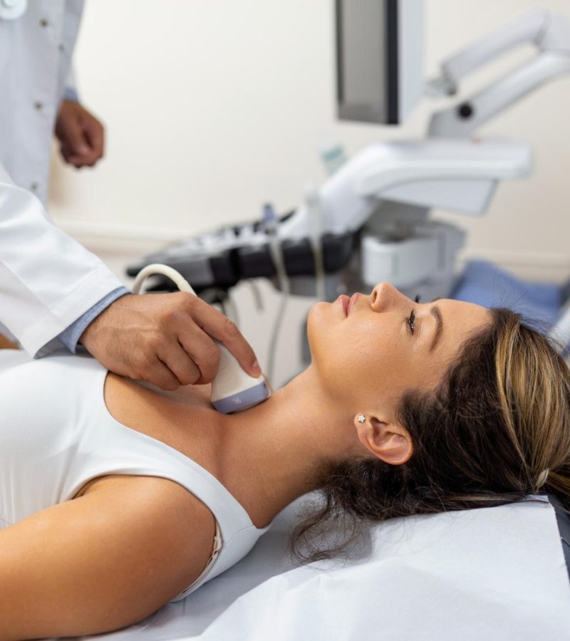 doctor-making-ultrasound-thyroid-gland-woman-patient-clinic-diagnosis-treatment-autoimmune-thyroiditis-concept